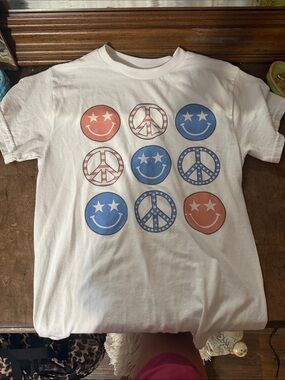 We The Free White Short Sleeve Tee with Red & Blue Peace Smile Graphics
